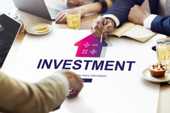 Investors discussing the purchase of an investment property